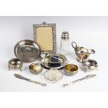 A selection of silver, silver-plated and white metal tableware and accessories, to include a pair of