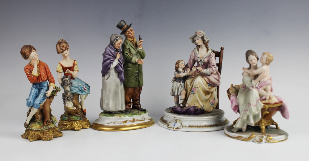 A collection of five Capodimonte figures, to include a mother and child, 18cm high, a pair of