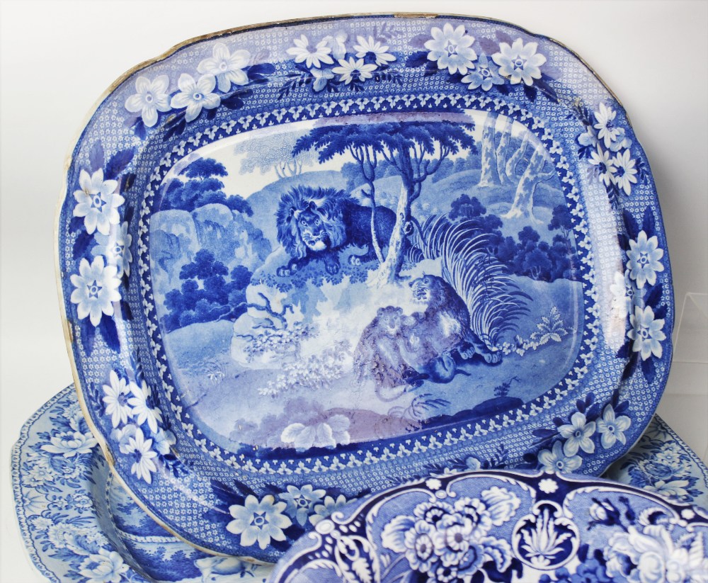 An Adams blue and white pearlware meat plate, 19th century, transfer printed with lions in a