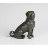 A 19th century novelty pewter pepperette modelled as a pug, designed seated and with a screw cap,