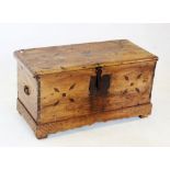 A 19th century continental pine blanket chest, the hinged cover centred with an inlaid star