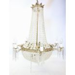 A gilt metal and glass droplet bell shaped pendant light fitting, mid 20th century, the lines of