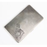 A silver cigarette case by A Wilcox, Birmingham 1949, of rectangular form with canted corners and