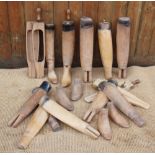 A collection of assorted beech wood boot trees, early 20th century and later, of typical form with