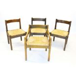 A set of eight Vico Magistretti 1970's beech wood chairs, each with a concave rail back above an