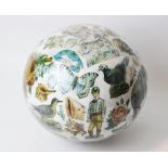 A Victorian decoupage glass sphere, the globe shaped blown ball internally decoupage decorated
