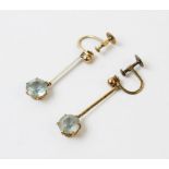 A pair of early 20th century 'aquamarine' drop earrings, each comprising a round mixed cut