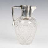 A George V silver mounted cut glass claret jug by John Grinsell & Sons, Birmingham 1911, of baluster