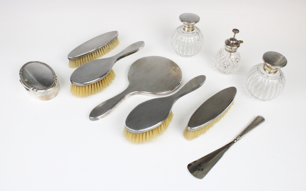 An Art Deco Britannia standard silver backed dressing table set by British Metallising Co Ltd,