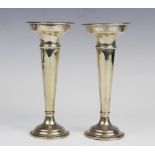 A pair of George V silver posy vases by Walker & Hall, Sheffield 1919, each of trumpet form with