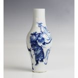 A Chinese porcelain blue and white vase, Kangxi (1661-1722), of lobed slender cylindrical form