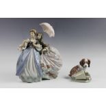 Two Lladro figures, comprising: No5.700 Little Lady With Flowers and 07672 It Wasn't Me, each in