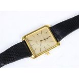 An 'Omega De Ville' stainless steel quartz wristwatch, the rectangular gold toned dial with baton