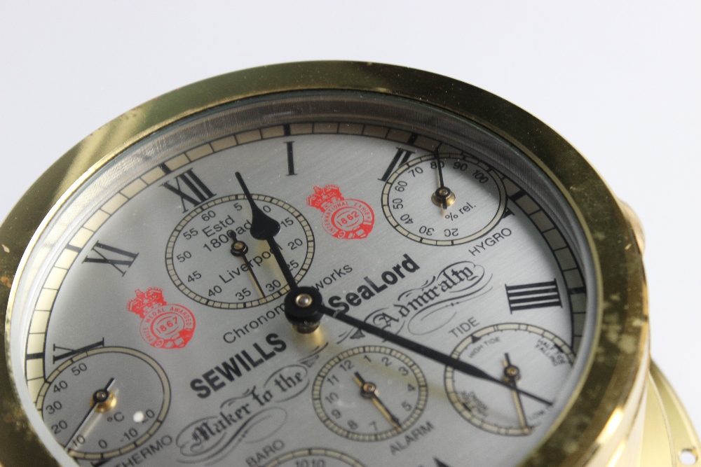 A Sewills 'Sealord' reproduction brass cased ships clock, the 11cm silvered dial with six subsidiary - Bild 3 aus 3