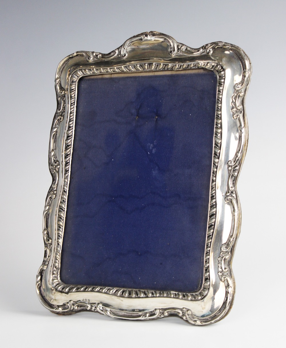 An Edwardian silver mounted photograph frame, Birmingham 1909 (maker's marks worn), of rectangular