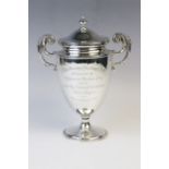An Edwardian silver twin-handled trophy cup and cover by William Hutton & Sons, London 1905, the urn