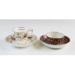 A Worcester porcelain tea bowl and saucer, circa 1775, decorated in the Queen Charlotte pattern,