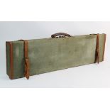 A Brady canvas and leather shot gun case, 20th century, of typical form with buckled leather over-