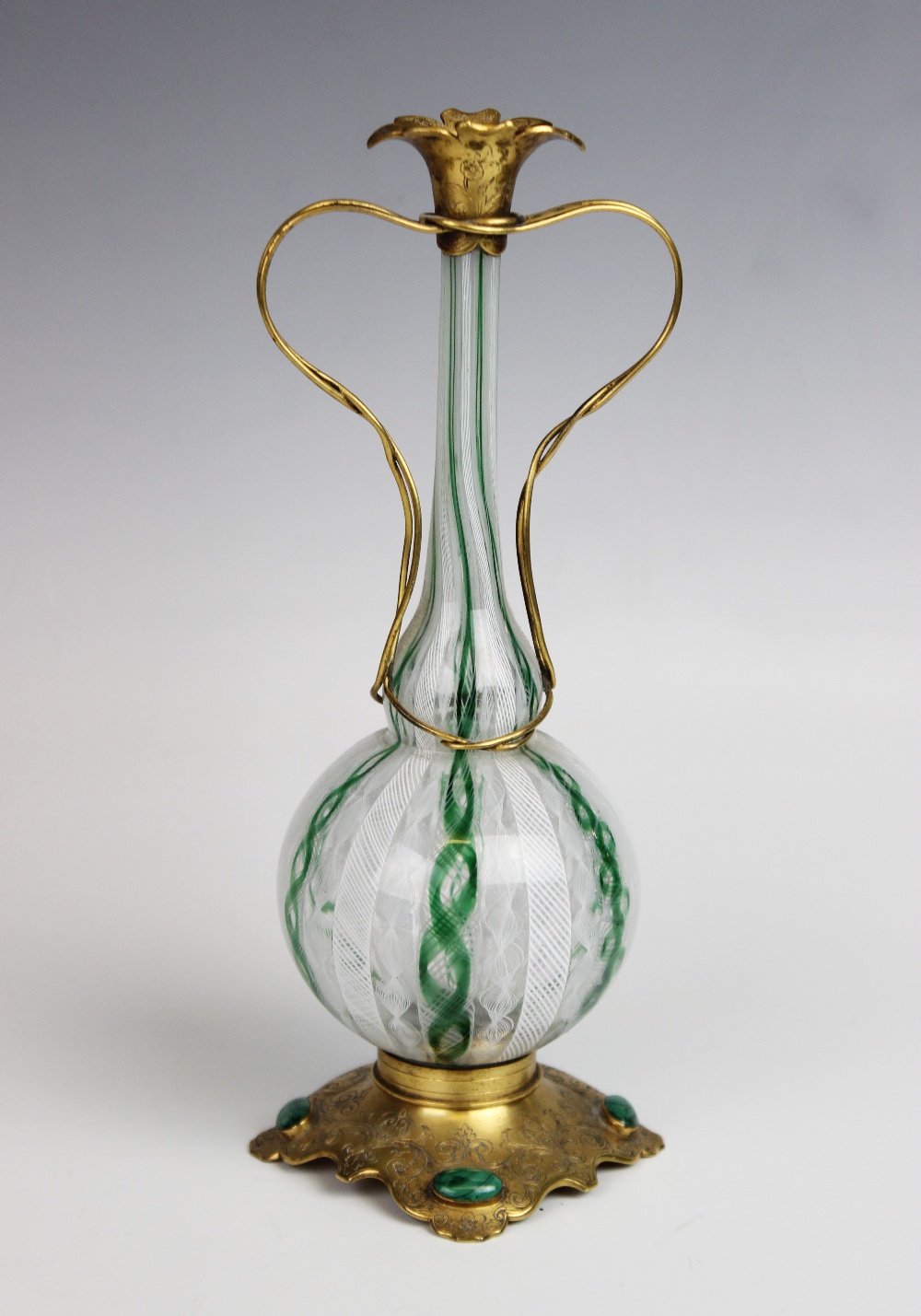 A 19th century Venetian latticino glass posy vase, the green, white and clear glass vase of globular