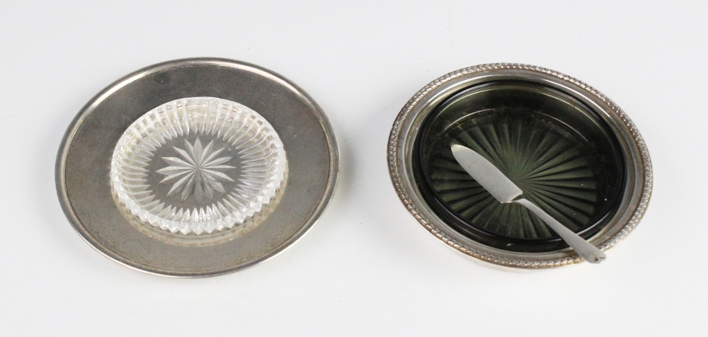 A silver mounted butter dish by Joseph Gloster Ltd, Birmingham 1961, of circular form with foliate