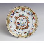 A Chinese porcelain famille rose plate, Yongzheng (1722-1735), the plate of circular form
