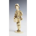 A large and fine Japanese signed ivory okimono, Meiji period (1868-1912), intricately carved
