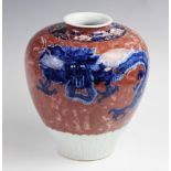 A 19th century Chinese porcelain vase, the Meiping shaped vase quarterly decorated against a sponged