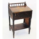 A Victorian stained pine ecclesiastical clerks desk, the rear spindle gallery enclosed by tapering