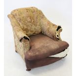 A 19th century club chair, in foliate fabric, the down swept padded arms enclosing the sprung bow