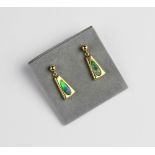 A pair of 14ct gold opal set drop earrings, each designed as a tapered panel set with a teardrop