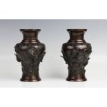 A pair of Japanese polished bronze vases, Meiji period (1868-1912), each baluster shaped vase