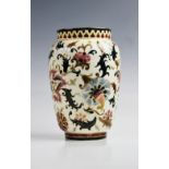 A Zsolnay Pecs baluster vase, late 19th century, polychrome enamelled with floral and foliate sprays