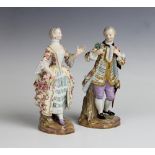 A pair of 19th century Meissen porcelain figures, modelled as a classical gentleman and lady in 18th