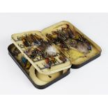 A Malloch Patent No.13561 tin of flies, enclosing a selection of hand tied salmon and other flies,