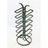 A cast iron twelve bottle wine rack, mid 20th century, the green painted rack constructed as six