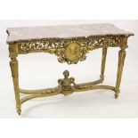 A Louis XVI style marble top and gilt wood console table, late 19th/early 20th century, the shaped