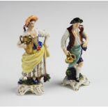 Two Rudolf Kämmer continental porcelain figures, mid 20th century, one modelled as a country lady