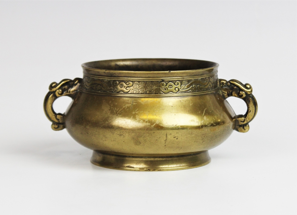 An 18th/19th century Chinese bronze censer, Xuande six character mark, the polished exterior of
