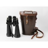 A pair of Barr & Stroud CF41 7X binoculars, 20th century, 24cm high, in leather case (at fault)