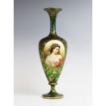 A Bohemian green glass portrait vase, 19th century, of slender inverted baluster form with