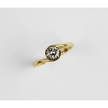 A diamond solitaire ring, the central round brilliant cut diamond weighing approximately 0.35