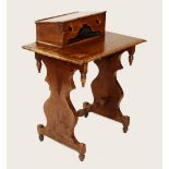 A Victorian scumbled pine side table, the rectangular moulded top applied with a hinged rear box