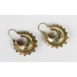 A pair of Victorian Etruscan Revival earrings, each designed as a faceted hoop with punched and