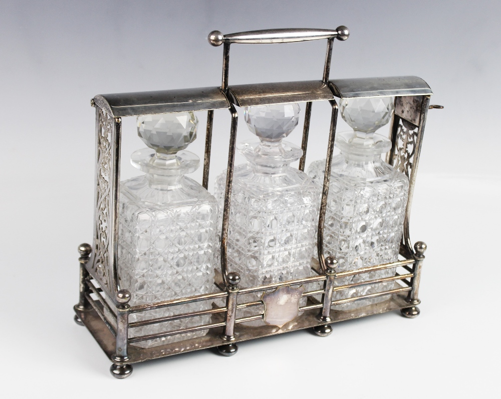 A silver plated three-bottle tantalus with Hobbs & Co London lock, of rectangular form with - Image 3 of 3
