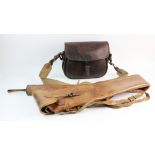 A leather cartridge bag by Payne & Gallway, of typical form with brass fittings and canvas