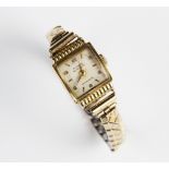 A lady's vintage 18ct gold Mithra wristwatch, the square cream colour dial with Arabic and baton