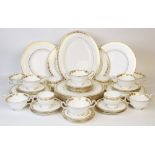 A Wedgwood part service in the 'Whitehall' pattern, comprising: eleven dinner plates, twelve salad