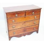 An early 19th century mahogany chest of drawers, with an arrangement of two short over three long