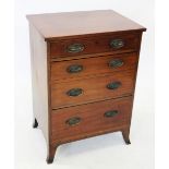 A 19th century mahogany chest of drawers, with an arrangement of three drawers, the deep middle