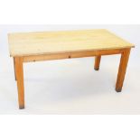 A Victorian style pine kitchen table by Conran, late 20th century, the rectangular slab top on